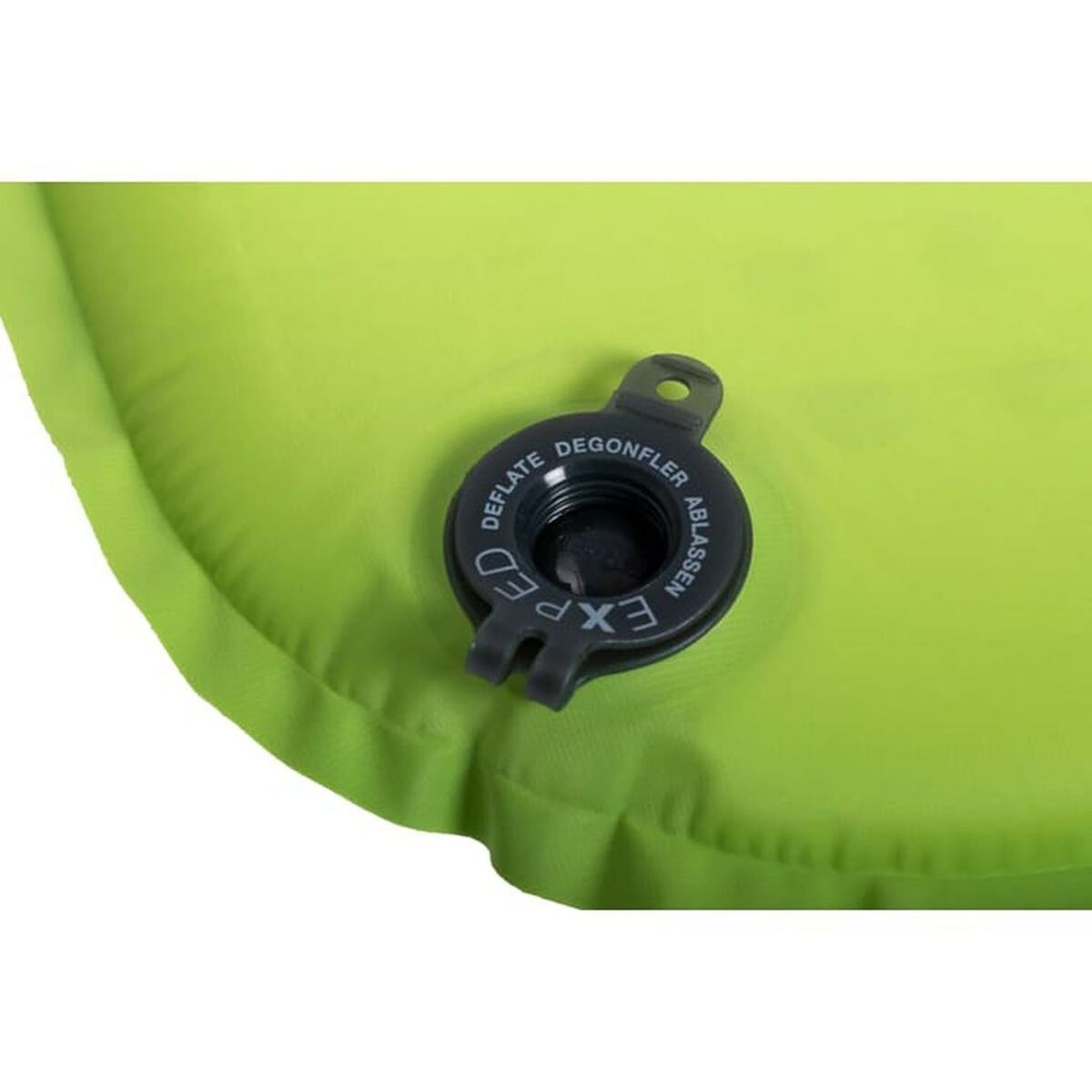 Detachable valve of a green Exped sleeping pad for easy deflation and convenience.